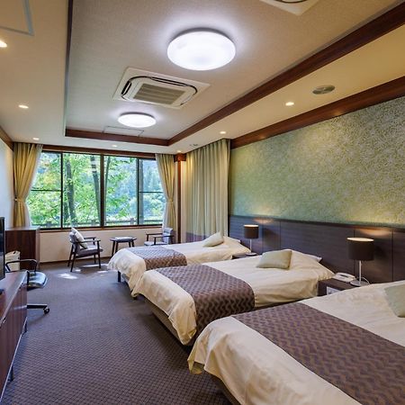 Okutamaji Hotel Ome Eksteriør billede
